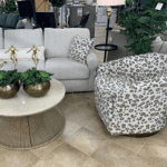 cream couch with leopard accent chair